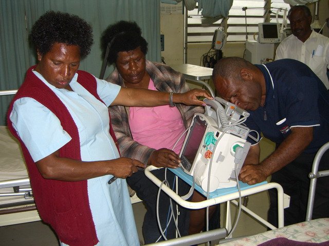 Nurses at Mt. Hagen General Hospital — user training on a new Philips MRx defibrillator/monitor